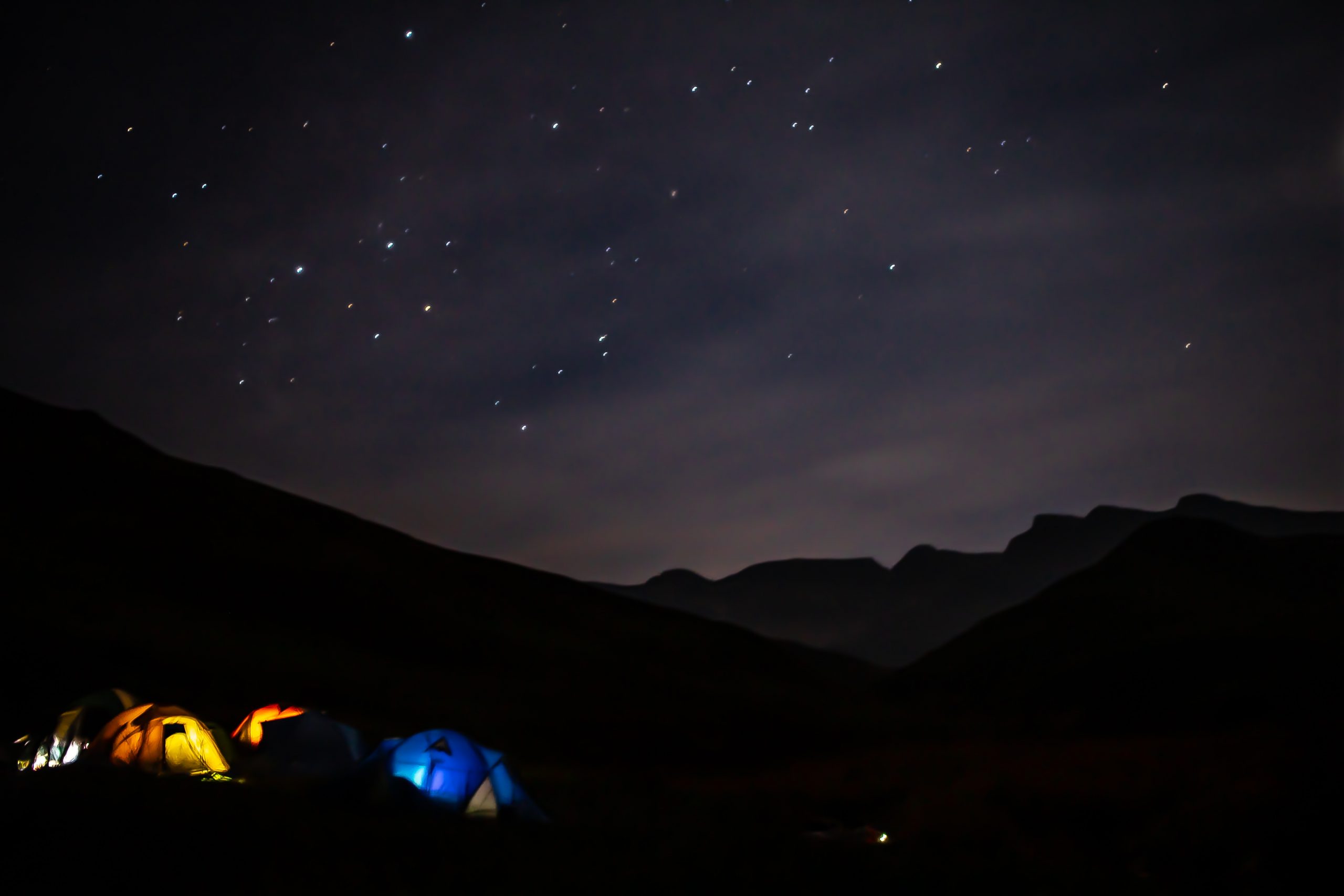 blue tent over star sky